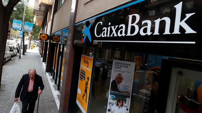 La 'hu&iacute;da' de La Caixa, ahora CaixaBank, de Barcelona a Valencia marc&oacute; el camino a centenares de empresas