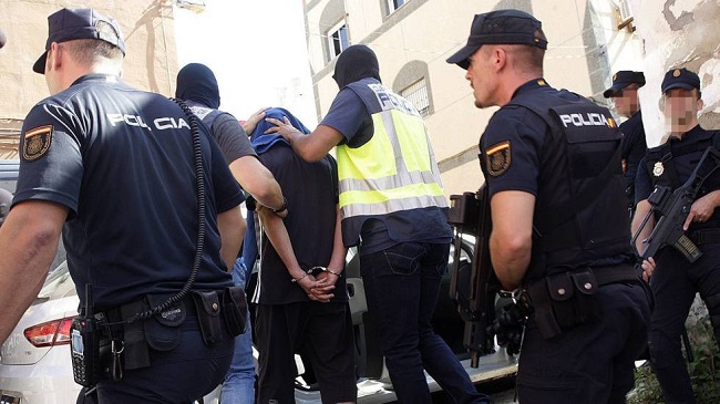Agentes de la Policía Nacional durante una detención. Agentes de la Policía Nacional durante una detención.