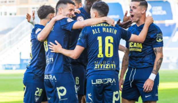Jugadores del UCAM CF celebran un gol en La Condomina / UCAM Murcia CF vía “X” Jugadores del UCAM CF celebran un gol en La Condomina / UCAM Murcia CF vía “X”