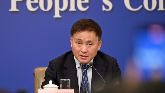China, Beijing: Pan Gongsheng, head of the Chinese central bank, speaks to journalists. Several ministry representatives answered questions about the economy at a press conference during the Chinese People's Congress China, Beijing: Pan Gongsheng, head of the Chinese central bank, speaks to journalists. Several ministry representatives answered questions about the economy at a press conference during the Chinese People's Congress