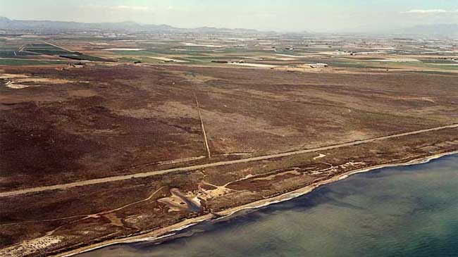 Terrenos y playa de El Carmol&iacute;, en Los Urrutias